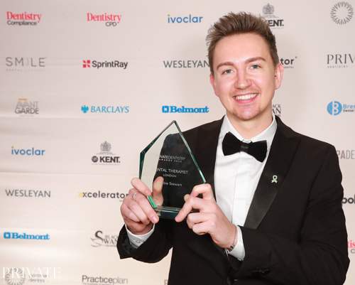 Robbie Stewart, dental therapist at DRMR Clinic, receiving Dental Therapist of the Year London 2025 at the Private Dentistry Awards